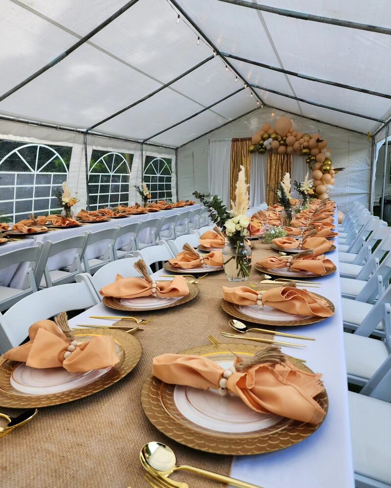 Boho outdoor tent long table setting